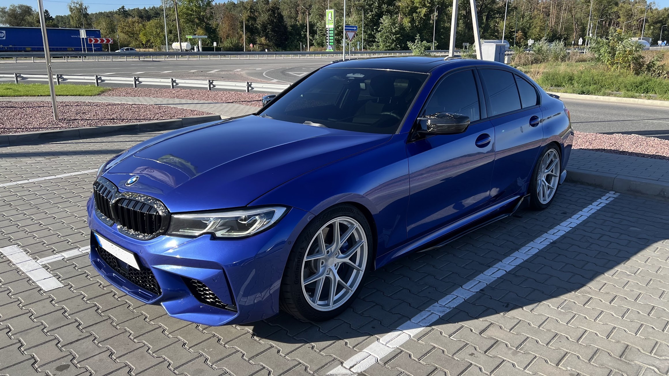 Fourth BMW G20 M340i xDrive built engine project car on the lift and street